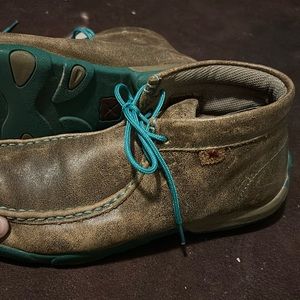 Women’s green twisted X.